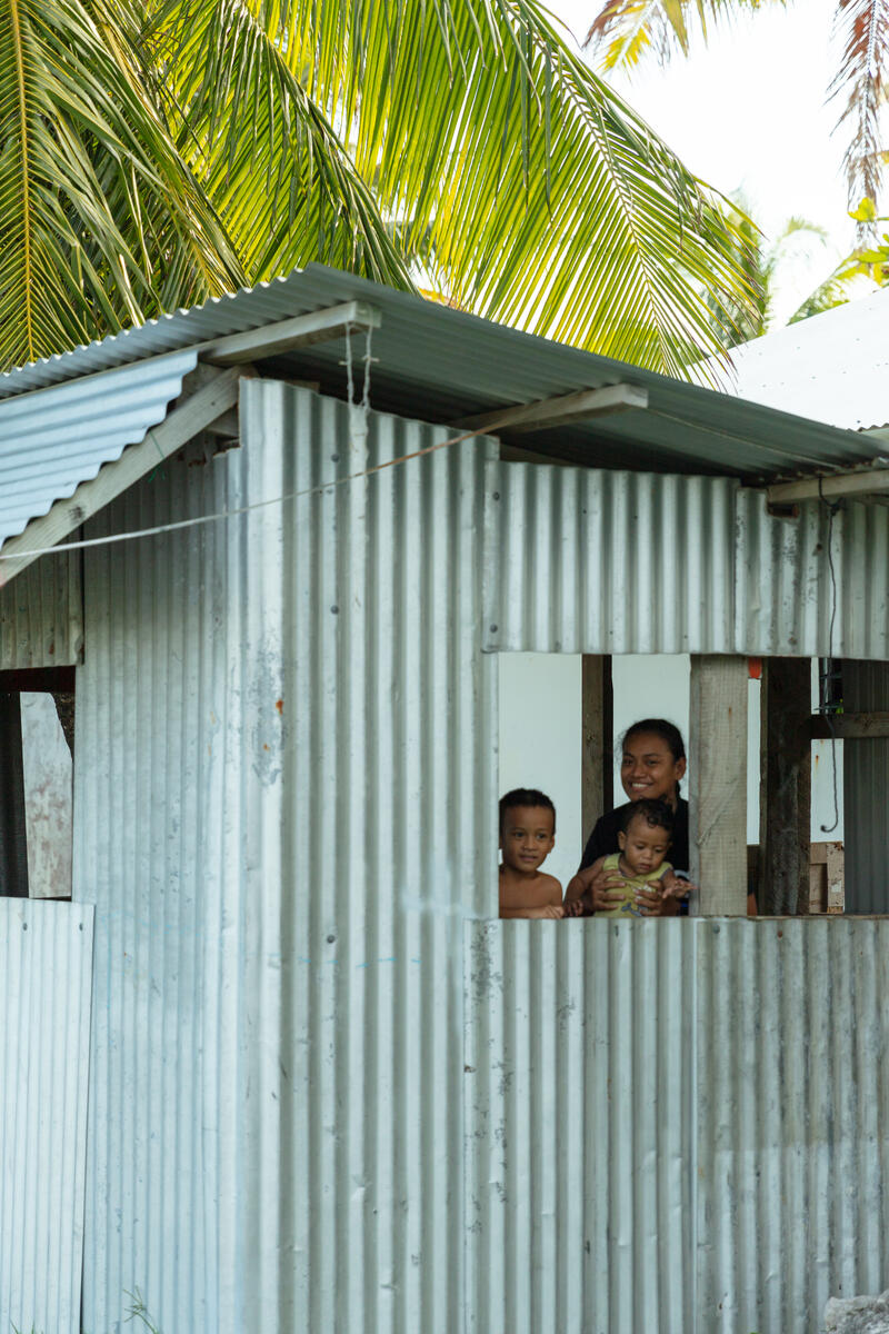 Local Family in Home, Funafuti, Tuvalu. © Greenpeace / Bianca Vitale