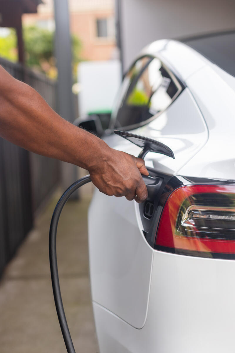 Charging Electric Vehicle at Home in Australia. © Greenpeace / Bianca Vitale